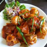 Pan Fried Veg Momo With Red Chilli oil